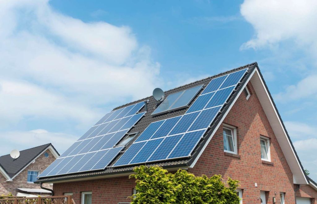 House with rooftop solar panels